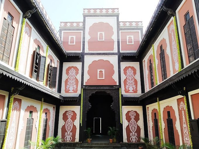A colorful building with intricate patterns and designs, possibly depicting a historical landmark or palace.